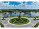 Beautiful aerial view of the neighborhood lake and fountains in a desirable community at 4326 Silo Port Ct, Lakewood Ranch, FL 34211
