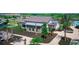 Attractive clubhouse with a modern design, lush landscaping, and a convenient bike rack at 4326 Silo Port Ct, Lakewood Ranch, FL 34211