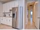 Kitchen featuring stainless steel refrigerator and white cabinets at 4326 Silo Port Ct, Lakewood Ranch, FL 34211