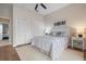 Main bedroom with hardwood flooring, closet, and coastal decor at 727 Holly Rd, Anna Maria, FL 34216