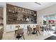 Cafe with table seating, modern decor, and shelving at 16127 Fortezza Dr, Bradenton, FL 34211