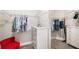 Spacious walk-in closet with ample storage and organization, featuring wire shelving and a dresser at 16127 Fortezza Dr, Bradenton, FL 34211