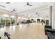 Spacious fitness center with mirrored walls, wood floors, and modern workout equipment at 16127 Fortezza Dr, Bradenton, FL 34211