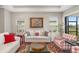 Cozy living room with stylish furnishings, neutral tones, and plenty of natural light at 16127 Fortezza Dr, Bradenton, FL 34211