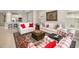 Comfortable living room with stylish decor, plush seating, and abundant natural light at 16127 Fortezza Dr, Bradenton, FL 34211
