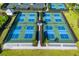 Overhead view of meticulously designed and maintained pickleball courts at 16127 Fortezza Dr, Bradenton, FL 34211