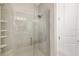 Modern walk-in shower with glass enclosure and sleek hardware at 16127 Fortezza Dr, Bradenton, FL 34211