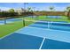 Close-up view of community tennis and pickleball courts at 16127 Fortezza Dr, Bradenton, FL 34211