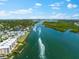 Breathtaking aerial view of a waterfront condo featuring boating access to the open waters and stunning views at 5855 Midnight Pass Rd # 311, Sarasota, FL 34242