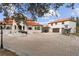 Elegant Mediterranean home with a fountain, covered parking and a separate garage for boat storage at 1450 Bern Creek Loop, Sarasota, FL 34240