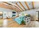 Bright living room with cozy seating, a fireplace, and an open layout with natural light at 213 84Th St, Holmes Beach, FL 34217