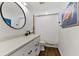 This is a clean bathroom with modern fixtures and stylish decor at 3409 Anchor Bay Trl, Lakewood Ranch, FL 34211