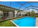 This backyard is complete with a refreshing pool and relaxing lounge chairs at 3409 Anchor Bay Trl, Lakewood Ranch, FL 34211