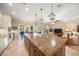 View of a large kitchen island perfect for entertaining, with views of the living room at 3904 Waypoint Ave, Osprey, FL 34229