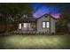 Charming home featuring a welcoming front porch, well-maintained lawn, and classic architectural details at 4536 1St N Ave, St Petersburg, FL 33713