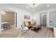 Bright and modern living room with stylish decor, seamlessly connecting to the dining area at 4536 1St N Ave, St Petersburg, FL 33713