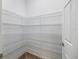 Walk-in pantry with wire shelving providing ample storage at 6077 Amberly Dr, Bradenton, FL 34208