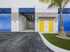 Commercial storage unit with an opened overhead garage door at 8100 Ciboney Ct # 9, Sarasota, FL 34240