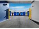 Modern building with colorful doors and drive-through at 8100 Ciboney Ct # 9, Sarasota, FL 34240