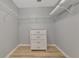 Closet features white drawers and white wire shelving for storage at 8402 Grand Estuary Trl # 101, Bradenton, FL 34212