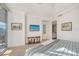 Comfortable bedroom featuring a large window, ensuite, and modern fixtures at 1155 N Gulfstream Ave # 607, Sarasota, FL 34236