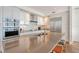 Bright, modern kitchen with stainless steel appliances, sleek cabinetry, and a large center island at 1155 N Gulfstream Ave # 607, Sarasota, FL 34236