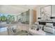 Modern lobby showcasing seating area, sleek decor, and sunlit atrium at 1155 N Gulfstream Ave # 607, Sarasota, FL 34236