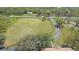 Aerial view of acreage with wooden fence and long drive at 12001 Backwater Rd, Sarasota, FL 34240