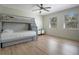 Bedroom with a bunk bed and a ceiling fan providing a comfortable space to relax at 12001 Backwater Rd, Sarasota, FL 34240