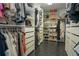 Walk-in closet with custom shelves, drawers, and hanging rods, providing ample storage space at 12001 Backwater Rd, Sarasota, FL 34240