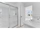 Bathroom with a glass-enclosed shower and double sink vanity at 16606 San Nicola Pl, Lakewood Ranch, FL 34211
