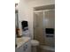Bathroom with a glass-enclosed shower, neutral tile and countertops at 3314 Mcdill Rd # 3314, Bradenton, FL 34207