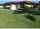 Manicured front yard and covered parking enhance this single-story home at 3314 Mcdill Rd # 3314, Bradenton, FL 34207