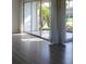 Living room with sliding glass doors offering backyard views at 3314 Mcdill Rd # 3314, Bradenton, FL 34207