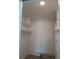 Walk-in closet with built-in shelving and new flooring at 3314 Mcdill Rd # 3314, Bradenton, FL 34207
