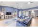 Spacious living room features soaring ceilings, tile floors, and a modern color palette at 3607 Darin Dr, Punta Gorda, FL 33950