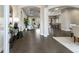 Inviting foyer with tile floors leading to open-concept living spaces and featuring high ceilings and stylish décor at 5203 Lake Overlook Ave, Bradenton, FL 34208