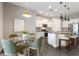Modern kitchen with granite counters, stainless steel appliances, and a casual dining area for everyday meals at 5203 Lake Overlook Ave, Bradenton, FL 34208