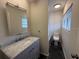 Bathroom featuring a shower/tub combo and vanity with marble countertops at 1007 Longfellow Cir, Sarasota, FL 34243