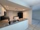 View of the kitchen area, featuring granite countertops and a stainless steel sink at 1007 Longfellow Cir, Sarasota, FL 34243
