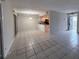 Spacious living room featuring tiled floors and natural light at 1007 Longfellow Cir, Sarasota, FL 34243