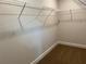 Walk-in closet with wire shelving and carpeted floor at 2648 Averland Loop, North Port, FL 34287