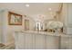 Bright and airy kitchen featuring granite countertops, stainless steel appliances, and custom cabinetry at 5740 Midnight Pass Rd # 307, Sarasota, FL 34242