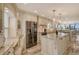 Modern kitchen with stainless steel appliances and a center island at 5740 Midnight Pass Rd # 307, Sarasota, FL 34242