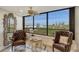 Comfortable seating area with beautiful views of the beach and ocean at 5740 Midnight Pass Rd # 307, Sarasota, FL 34242