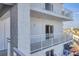 Building exterior showing multiple balconies overlooking the beach at 5830 Midnight Pass Rd # 502, Sarasota, FL 34242