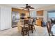 Bright kitchen features stainless steel appliances, granite countertops, and counter seating at 5830 Midnight Pass Rd # 502, Sarasota, FL 34242