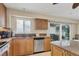 Bright kitchen features stainless steel appliances, granite countertops, and lots of counter space at 5830 Midnight Pass Rd # 502, Sarasota, FL 34242