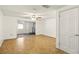 Bedroom with a ceiling fan, tiled floor and a sliding glass door at 1741 Font Ln, Holiday, FL 34691