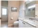 Powder room with granite countertop and direct access to the outdoor area at 3826 E 155Th E Ave, Parrish, FL 34219